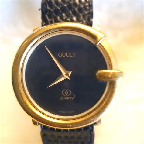 value of black and gold gucci watch|all gold Gucci watch.